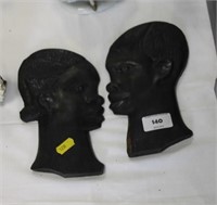2 African head plaques