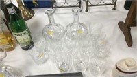 2 Decanters and 12 whisky glasses