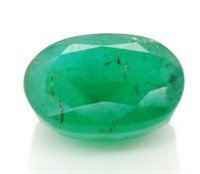 Loose treated emerald