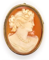 Carved cameo and silver gilt brooch