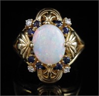 Opal, sapphire and diamond set 14ct gold ring