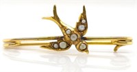 Edwardian 9ct yellow gold bird brooch