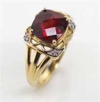 Garnet and diamond set 9ct yellow gold ring