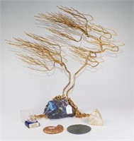 Gilded tree form on boulder opal base
