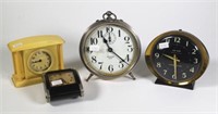 Four various vintage desk clocks