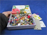box of various buttons