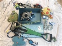22A designer box full of pet toys and supplies