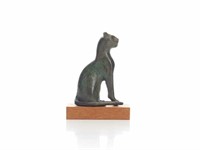 Egyptian bronze figure of a seated cat