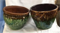 Two green and brown glazed pottery flower pots,