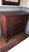 Antique empire mahogany four drawer chest with