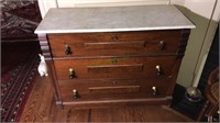 Marble top walnut Victorian three drawer chest,