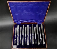 BOXED SET OF SILVER HANDLED FRUIT KNIVES AND FORKS