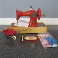 Toy sewing machine, mini radio flyer wheel barrel