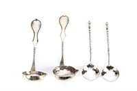 Two pairs of Dutch silver spoons
