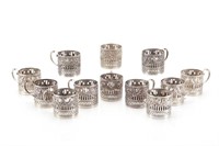 Twelve German silver tea glass holders