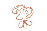 Two natural coral beaded necklaces & a bracelet