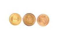 Three Continental gold coins