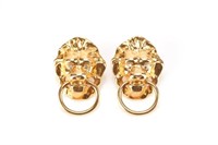 Pair of designer gold lion head earrings