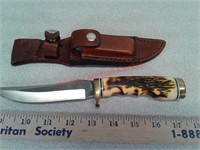 Schrade Uncle Henry knife with leather sheath and