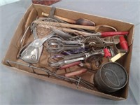 Assorted old-time kitchen utensils