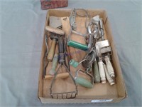 Assorted old-time kitchen utensils, green, white
