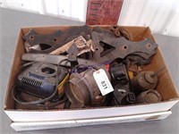 Box of misc:  hinges, oil cans, charger/battery