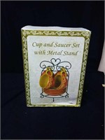 New in box cup & saucer set with stand