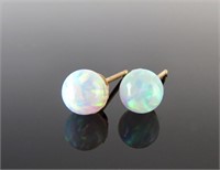 Pair of 14K Yellow Gold Mounted Opal Earrings