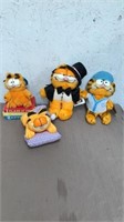 4 Garfield stuffed animals