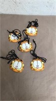 Five Garfield necklaces