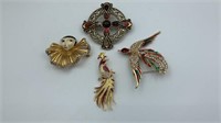 Lot of four colorful brooches