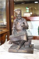 Heavy cast brass commemorative figure, cigar maker