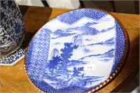 Oriental charger with blue and white glazed