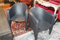 Pair of Dedon woven wicker armchairs