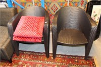 Pair of Dedon woven wicker armchairs