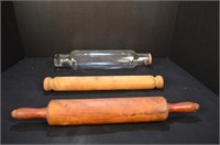 Two Wooden Rolling Pins and One Glass Rolling Pin