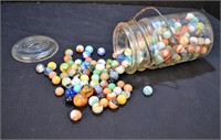 Vintage Jar full of early marbles