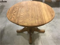 Drop leaf oak round table