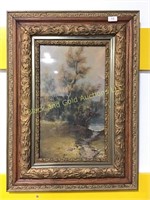 Heavily framed nature painting