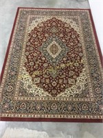 Large ornate floor rug