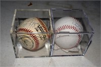2 Autographed Baseball's