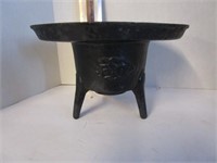 Vintage footed F A cast iron planter; neat piece