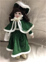 Victorian doll in green velvet