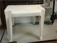 White plastic stool