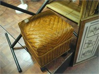 Brown wicker box on wheels