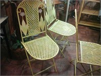Pair of 4 green foldable metal chairs