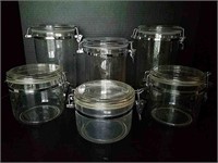 Six Clear and Stainless Storage Canisters