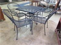 WROUGHT IRON PATIO TABLE WITH 4 CHAIRS