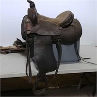 Western-style saddle with blanket