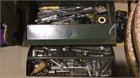 Green metal tool box with tools, pull out tray